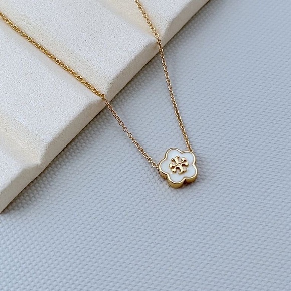 Tory Burch Gold and White Flower Pendant Necklace - Picture 1 of 3
